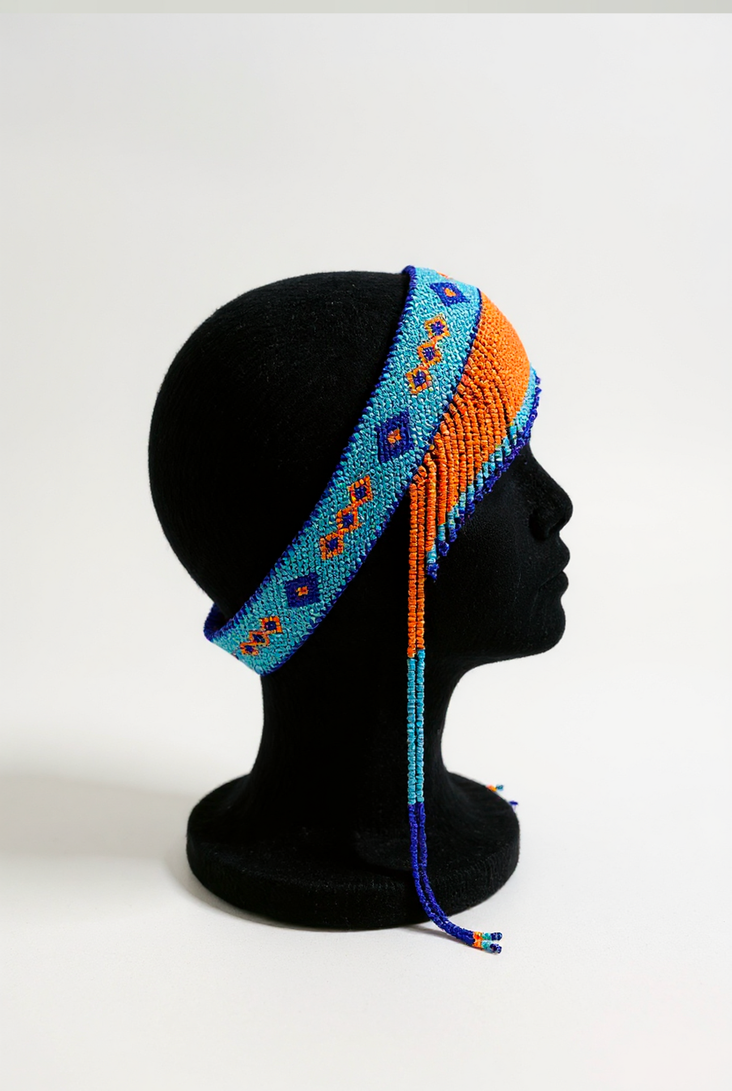 Beaded headband with tassels