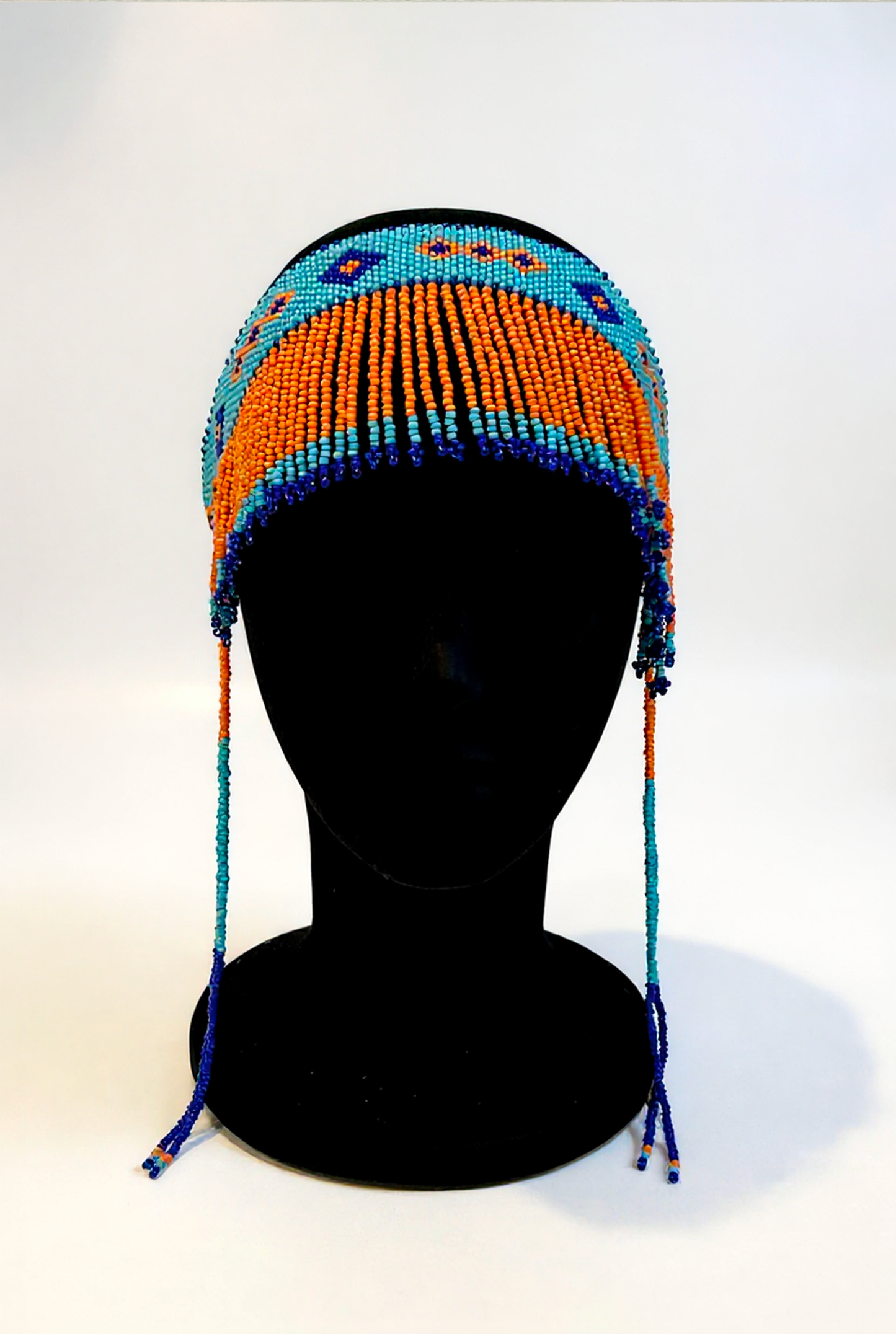 Beaded headband with tassels
